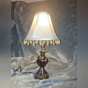 Elegant Brown Table Lamp with Gold Accents and Jewels Falling From Shade.